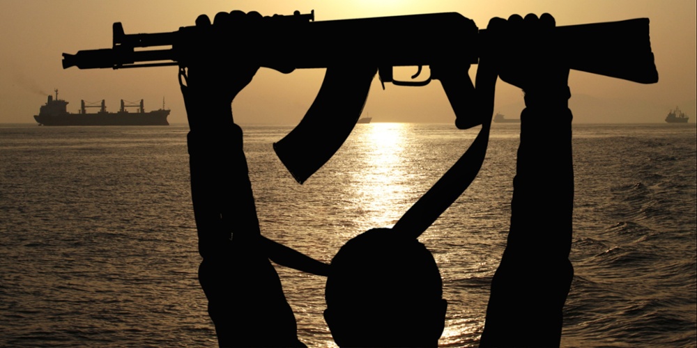 Pirate AK47 with ship in background twitter